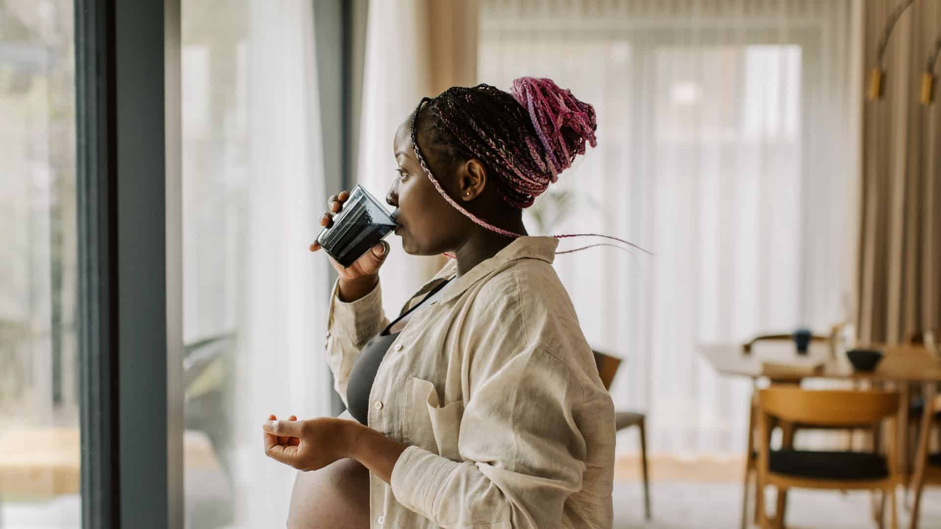 Pregnant woman drinking water