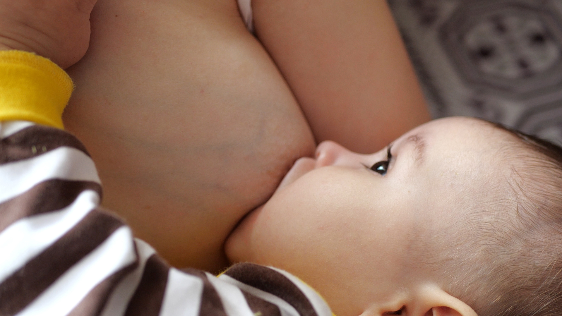Close up of baby breastfeeding